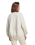 Felpa donna Adidas con zip JV9904 colore beige vestibilità ampia elegante, abbigliamento casual premium, posteriore