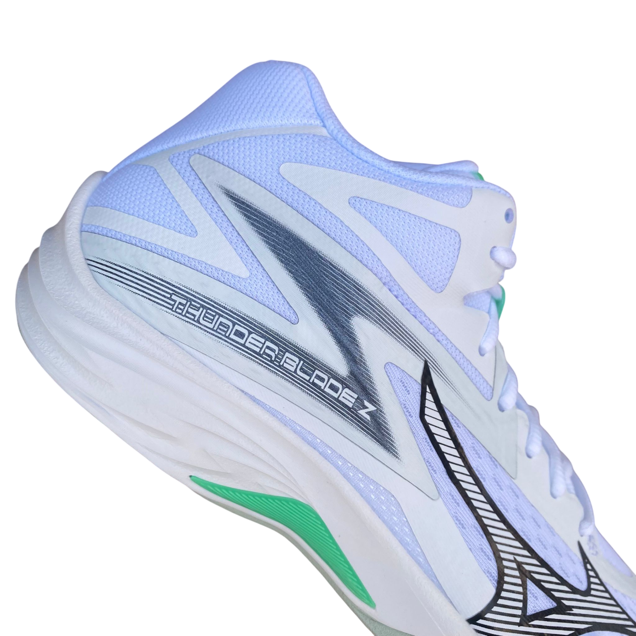 Scarpe da pallavolo Mizuno Thunder Blade Z Mid modello V1GA237516 colore bianco con design mid-cut per protezione caviglia professionale, vista suola