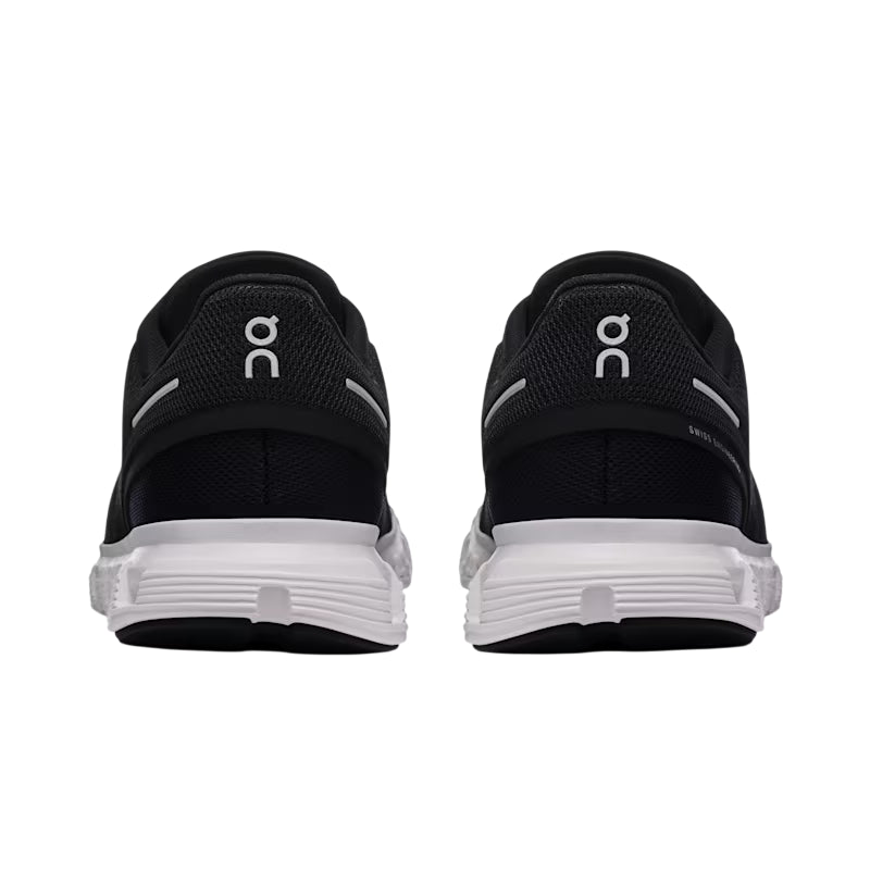 Vista posteriore delle scarpe running On Cloud 6 uomo nero-bianco, supporto del tallone migliorato per stabilità