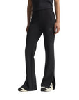 Pantalone svasato nero Adidas donna modello Soft Lux con taglio aderente e morbido, perfetto per il tempo libero e lo sport