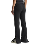 Pantalone svasato nero Adidas donna modello Soft Lux con taglio aderente e morbido, perfetto per il tempo libero e lo sport, vista posteriore