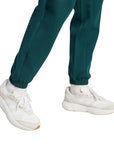 Pantalone sportivo Adidas donna JX0443 verde in misto cotone. Comfort e stile per sport e tempo libero. elastico alla caviglia