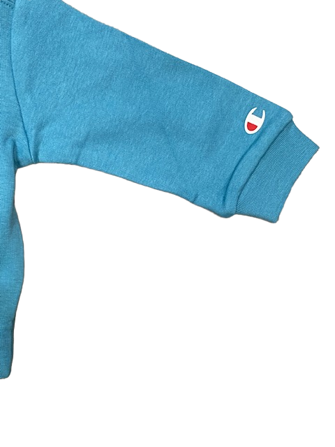 Champion tuta infant con felpa con bottoncini al collo e pantalone con polsino 306186 BS157 DLPB/NBK celeste-nero