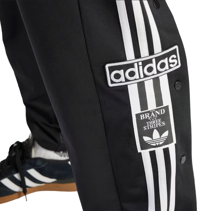 Adidas pantaloni con shop bottoni
