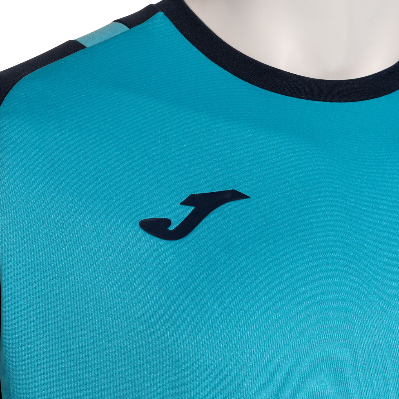 Completo sportivo Joma Lider Set uomo #104285.013 turchese fluorescente e blu scuro, t-shirt con collo rotondo e pantaloncino coordinato, pannelli in mesh traspirante