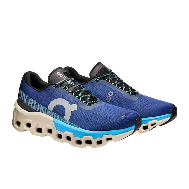 Vista frontale delle scarpe running On Cloudmonster 2 uomo tempesta-orizzonte, rocker dell'avampiede per propulsione in avanti