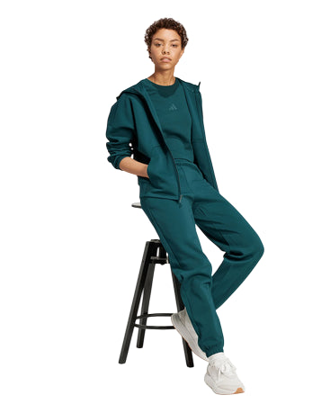 Pantalone sportivo Adidas donna JX0443 verde in misto cotone. Comfort e stile per sport e tempo libero. abbinato