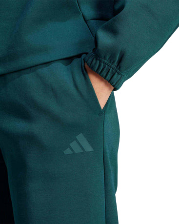 Pantalone sportivo Adidas donna JX0443 verde in misto cotone. Comfort e stile per sport e tempo libero. tasca