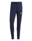 Adidas pantalone sportivo in cotone garzato  con banda e polsino Essentials Tapered Cuff IC9406 legend ink