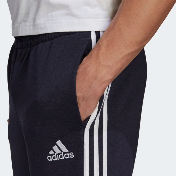 Adidas Pantalone Essentials French Terry Tapered Cuff 3-Stripes GK8888 blu bianco