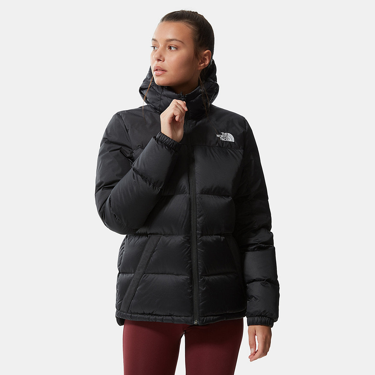 The North Face Diablo Down Hoodie - Il piumino tecnico che unisce calore eccezionale e design minimalista per affrontare l'inverno urbano con stile.